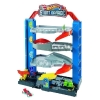 Garaż kaskaderski Stunt Garage Hot Wheels City Mattel Auto Czarne GNL70 4+